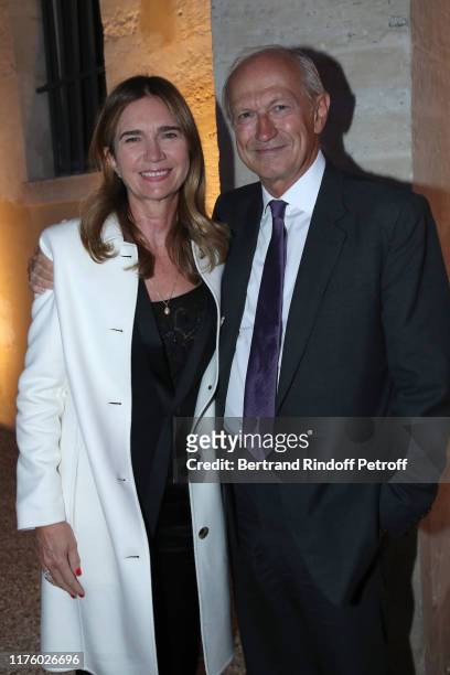 Chairman & Chief Executive Officer of L'Oreal Jean-Paul Agon and his wife Sophie Agon attend the Kering Heritage Days opening night at Kering and...