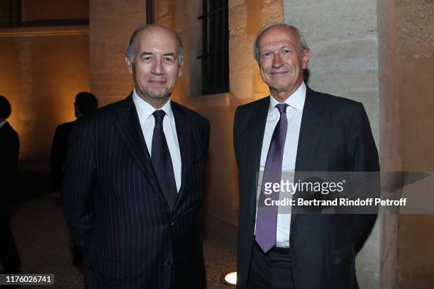Businessman Serge Weinberg and Chairman & Chief Executive Officer of L'Oreal Jean-Paul Agon attend the Kering Heritage Days opening night at Kering...