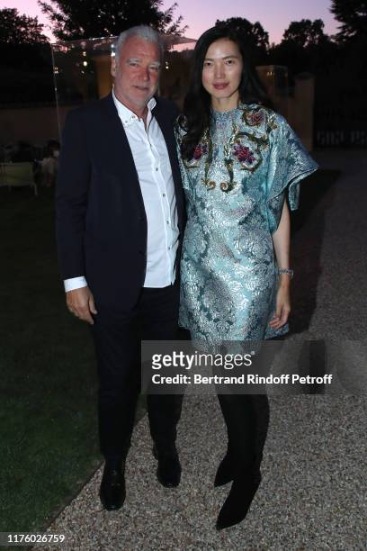 Galerist Patrick Seguin and Model Xi Lin attend the Kering Heritage Days opening night at Kering and Balenciaga Company Headquarter on September 20,...