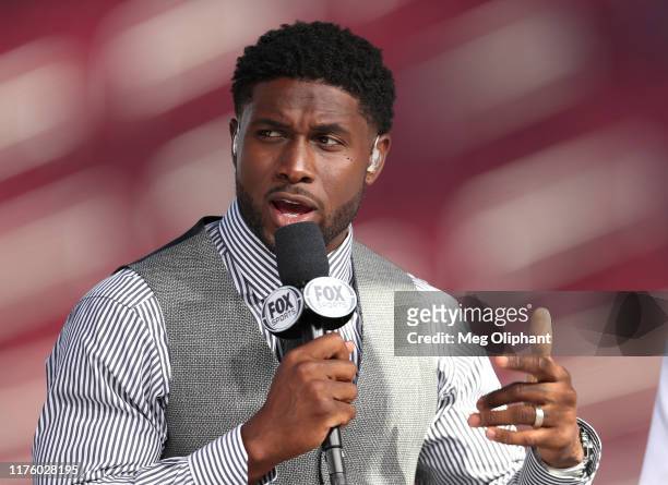 Former USC running back Reggie Bush attends the USC game against Utah as a guest on the pregame show on Fox Sports at Los Angeles Memorial Coliseum...