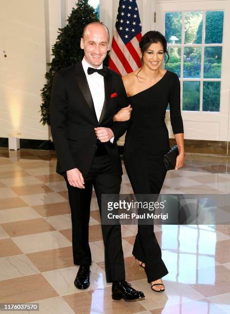White House advisor Stephen Miller and Katie Waldman arrive for the State Dinner at The White House honoring Australian PM Morrison on September 20,...