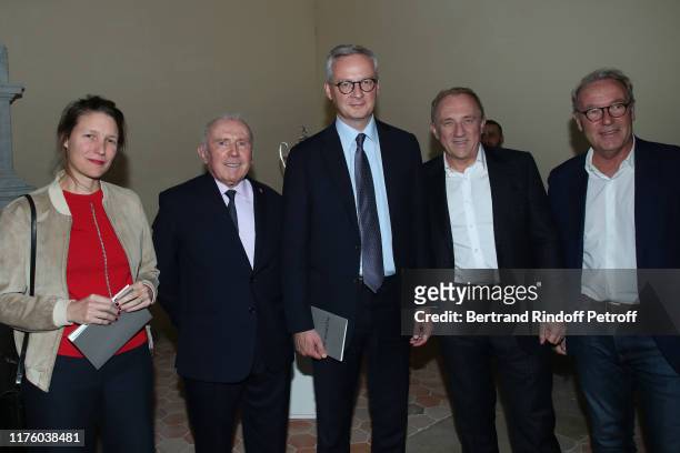 Francois Pinault , his son CEO of Kering Group, Francois-Henri Pinault , Politician Bruno Le Maire and his wife Pauline Doussau de Bazignan and...