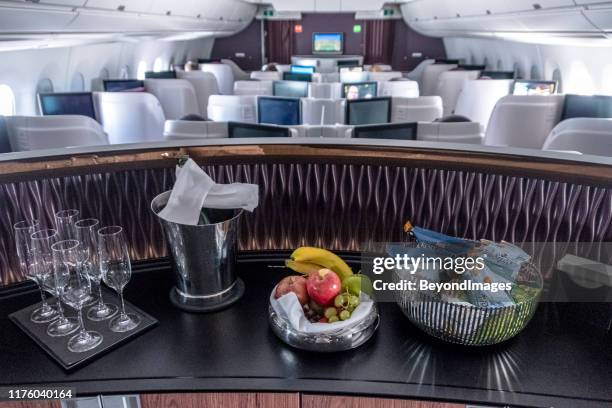 travelling in style: qatar business class cabin interior view - airbus concept cabin stock pictures, royalty-free photos & images