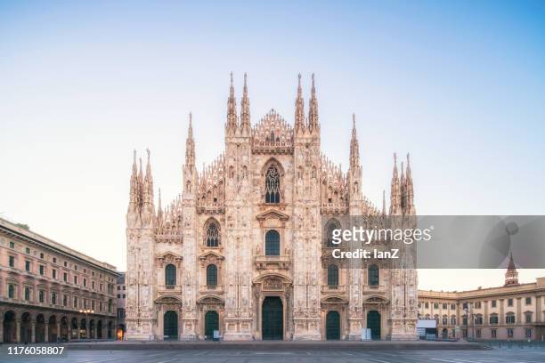 milan cathedral, duomo di milano at dawn - milan stock pictures, royalty-free photos & images