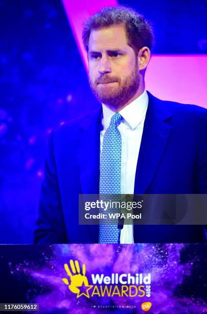 Prince Harry, Duke of Sussex reacts as he delivers a speech during the WellChild Awards at Royal Lancaster Hotel on October 15, 2019 in London,...