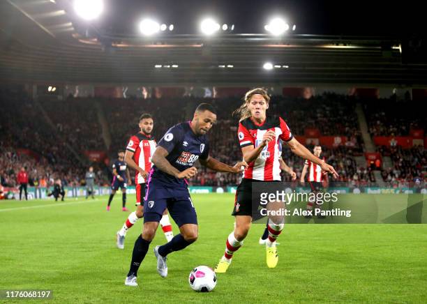 Aaron Ramsdale of AFC Bournemouth under pressure from Jannick Vestergaard of Southampton during the Premier League match between Southampton FC and...