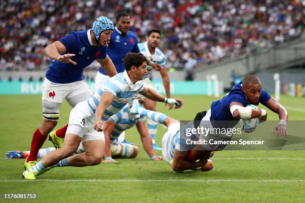 Virimi Vakatawa of France dives to score his side's first try during the Rugby World Cup 2019 Group C game between France and Argentina at Tokyo...