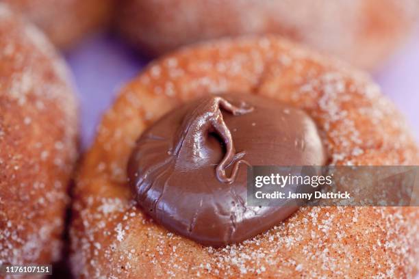 chocolate-filled donut - deep fried bildbanksfoton och bilder