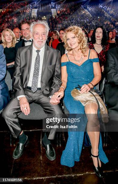 German actor and comedian Dieter Hallervorden with his partner Christiane Zander attends the Goldene Henne at Messe Leipzig on September 20, 2019 in...