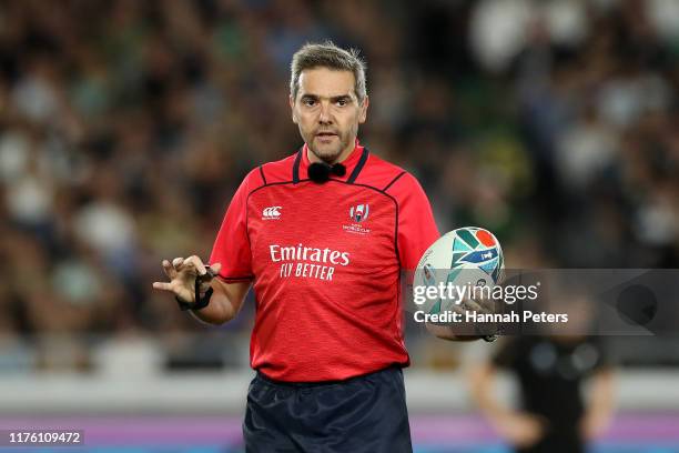 Referee Jerome Garces gestures during the Rugby World Cup 2019 Group B game between New Zealand and South Africa at International Stadium Yokohama on...