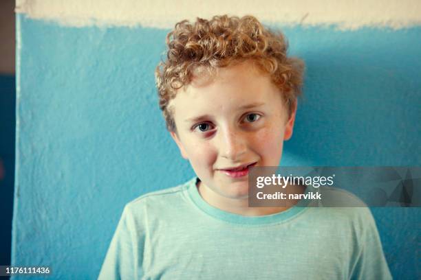 portrait of a young boy - boy curly blonde stock pictures, royalty-free photos & images