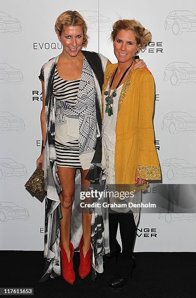 Designers Sarah-Jane Clarke and Heidi Middleton pose as they attend the launch of the Range Rover Evoque on June 29, 2011 in Melbourne, Australia.