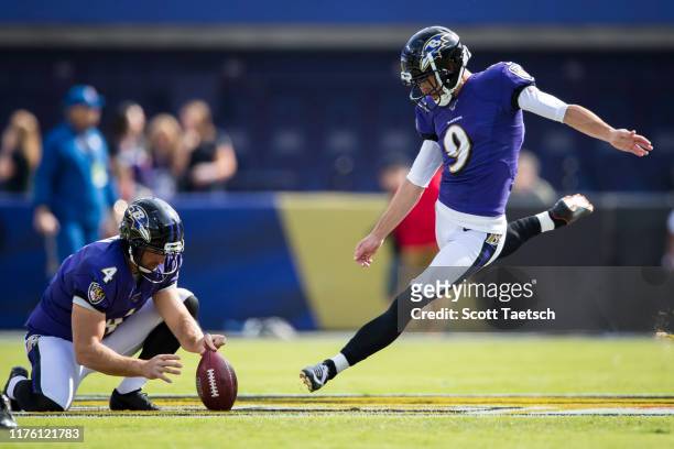Justin Tucker of the Baltimore Ravens kicks field goals before the game against the Cincinnati Bengals at M&T Bank Stadium on October 13, 2019 in...