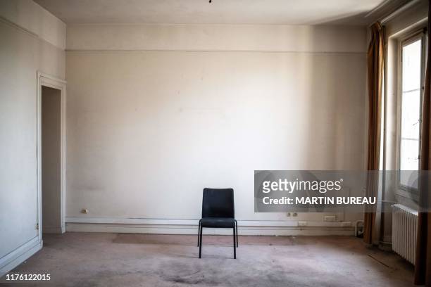 Picture taken on July 8, 2019 at the former police judicial headquarters known as the "36 quai des orfevres" in Paris, shows a chair in the office of...