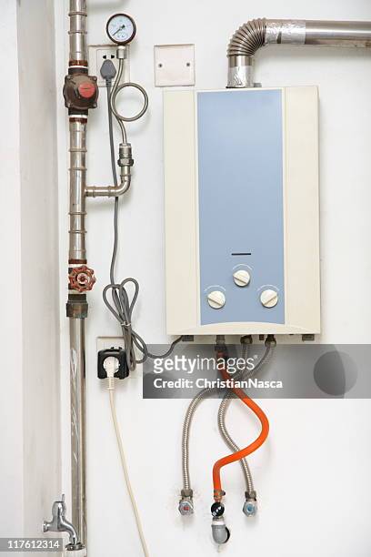 tankless esquentador de água quente - caldeira imagens e fotografias de stock