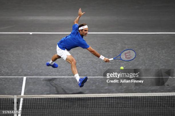 Roger Federer of Team Europe stretches to play a backhand in his singles match against Nick Kyrgios of Team World during Day Two of the Laver Cup...