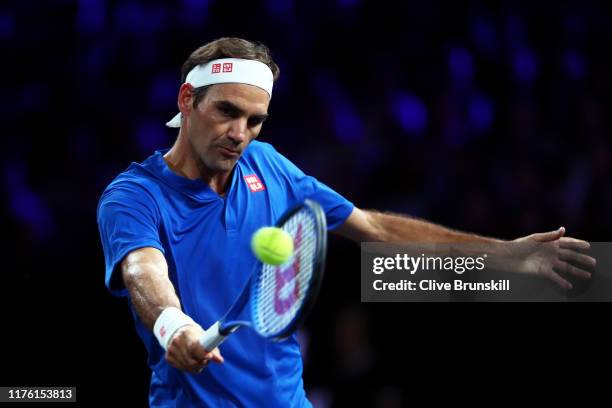 Roger Federer of Team Europe plays a backhand in his singles match against Nick Kyrgios of Team World during Day Two of the Laver Cup 2019 at Palexpo...