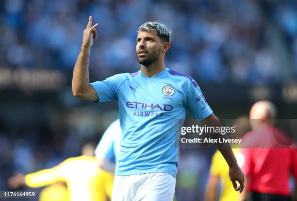 Sergio Aguero of Manchester City celebrates scoring his teams second goal during the Premier League match between Manchester City and Watford FC at...