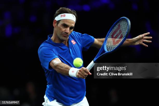 Roger Federer of Team Europe plays a backhand in his singles match against Nick Kyrgios of Team World during Day Two of the Laver Cup 2019 at Palexpo...