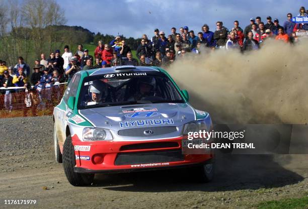 Kenneth Eriksson of Sweden slides his Castrol Hyundai through a corner during stage one of day one of the World Rally Championship of New Zealand in...