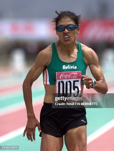 The bolivian athlete Niusila Mancilla runs the 1500 meter race and won the gold medal in Ambato, Ecuador, 12 September 2001. La atleta boliviana...