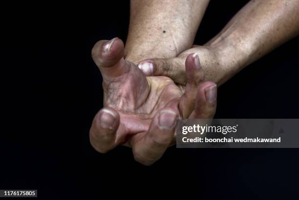 finger.hand trigger finger lock concept healthy white background - remedial massage stock-fotos und bilder