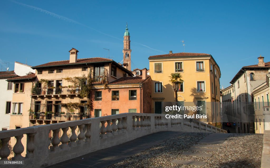Famous Basilica Palladiana tower seen from San Michele bridge in Vicenza, Italy