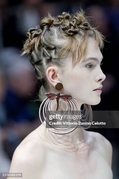 Model, jewellerdetail, walks the runway at the Giorgio Armani show during the Milan Fashion Week Spring/Summer 2020 on September 21, 2019 in Milan,...