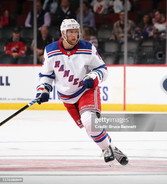 Joe Morrow of the New York Rangers skates against the New Jersey Devils at the Prudential Center on September 20, 2019 in Newark, New Jersey. The...