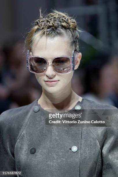 Model, accessdetail, walks the runway at the Giorgio Armani show during the Milan Fashion Week Spring/Summer 2020 on September 21, 2019 in Milan,...