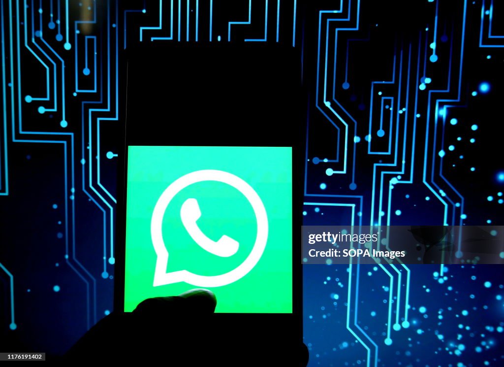 In this photo illustration a mobile messaging application,...