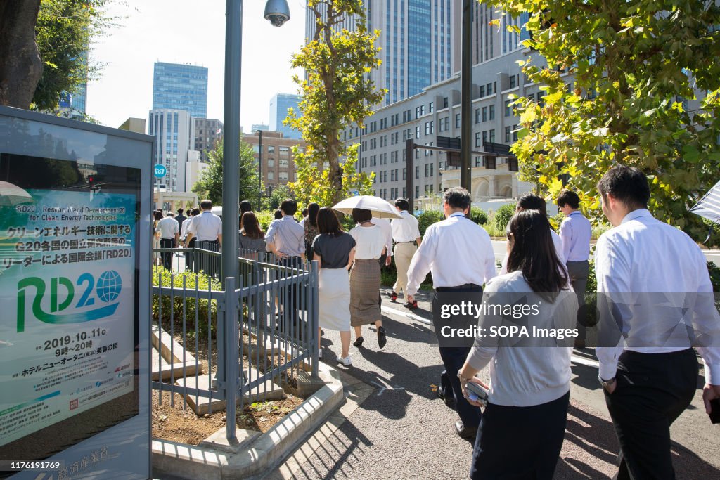 Employees of Ministry of Economy, Trade and Industry of...
