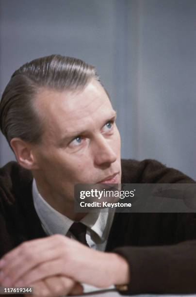 Headshot of Sir George Martin, British record producer and composer, 1965. Martin is sometimes referred to as 'the Fifth Beatle', owing to his...