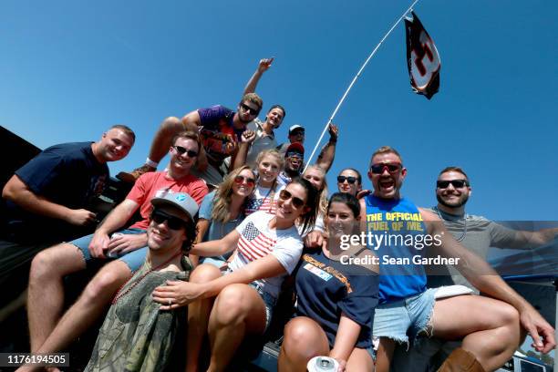 Fans tailgate prior to the Monster Energy NASCAR Cup Series Federated Auto Parts 400 at Richmond Raceway on September 21, 2019 in Richmond, Virginia.