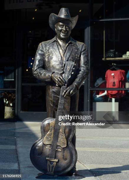 Bronze statue of country music singer Little Jimmy Dickens in front of the Ryman Auditorium in Nashville, Tennessee.