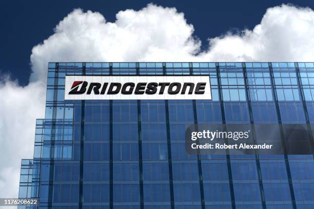 Cumulus clouds frame Bridgestone Tower in downtown Nashville, Tennessee. The skyscraper is headquarters for Bridgestone Americas, a subsidiary of...