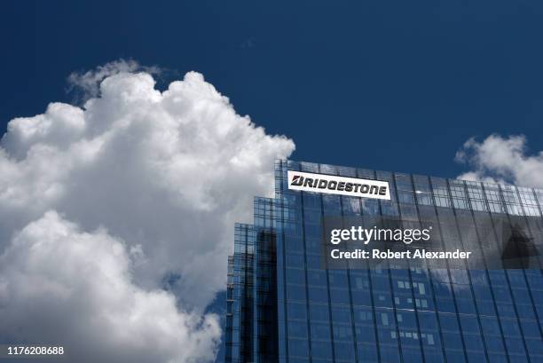 Cumulus clouds frame Bridgestone Tower in downtown Nashville, Tennessee. The skyscraper is headquarters for Bridgestone Americas, a subsidiary of...