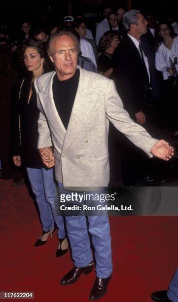 Actor James Caan and Ingrid Hajek attend the premiere of "Batman Returns" on June 16, 1992 at Mann Chinese Theater in Hollywood, California.