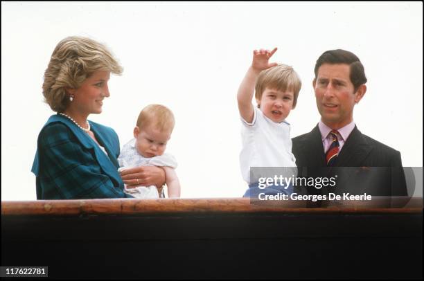 Diana the Princess of Wales holds her son Harry, whilst looking at Prince William held by his father Prince Charles on May 5, 1985 in Venice, Italy....