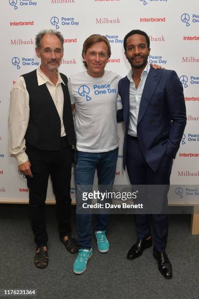 Mark Rylance, Jeremy Gilley and Andre Holland attend the 'Peace One Day' 20th Anniversary Celebration at Shakespeare's Globe on September 21, 2019 in...