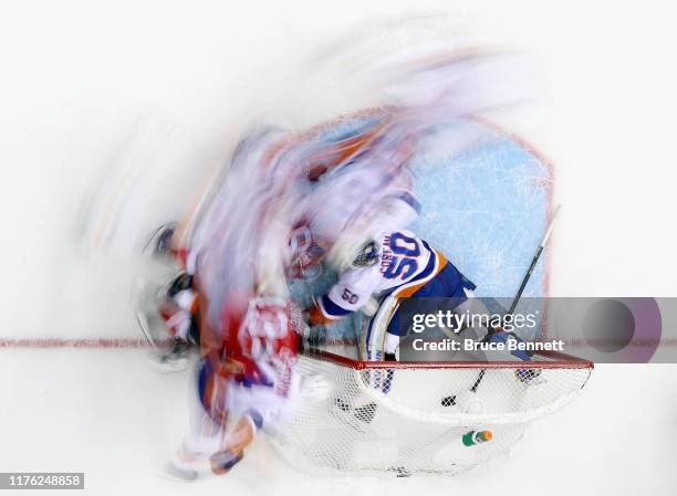 Jared Coreau of the New York Islanders makes the third period save against the New Jersey Devils at the Prudential Center on September 21, 2019 in...