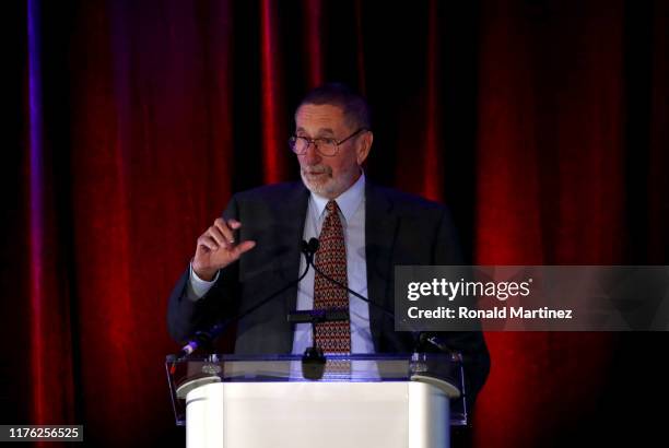 Photographer Tony Quinn speaks after accepting the 2019 Colin Jose Media Award during the 2019 National Soccer Hall Of Fame Induction Ceremony at...