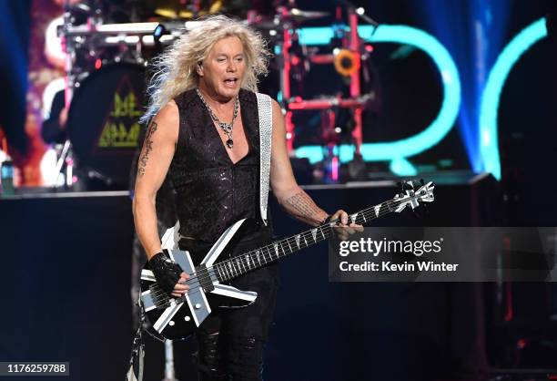 Rick Savage of Def Leppard performs onstage during the 2019 iHeartRadio Music Festival at T-Mobile Arena on September 21, 2019 in Las Vegas, Nevada.