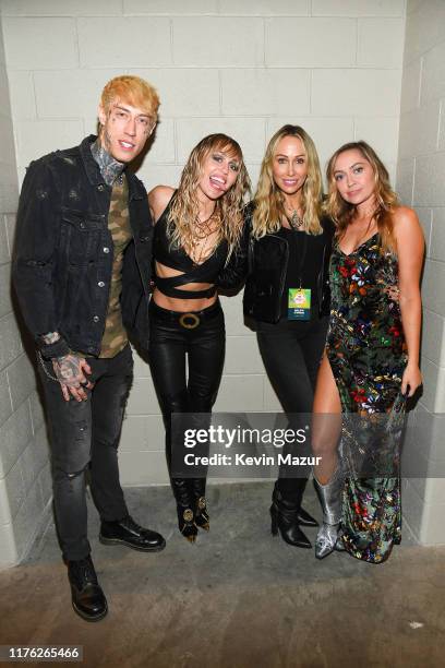 Trace Cyrus, Miley Cyrus, Tish Cyrus, and Brandi Cyrus pose backstage during the 2019 iHeartRadio Music Festival at T-Mobile Arena on September 21,...