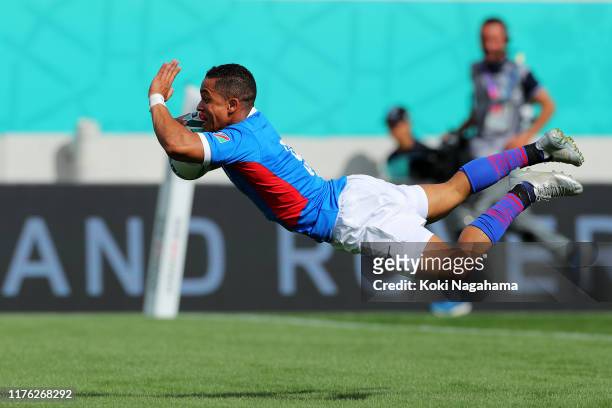 Damian Stevens of Namibia dives to score his side's first try during the Rugby World Cup 2019 Group B game between Italy and Namibia at Hanazono...