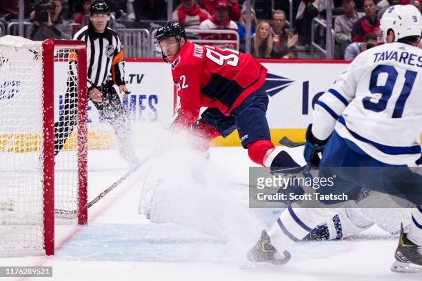 Evgeny Kuznetsov of the Washington Capitals scores a goal against Michael Hutchinson of the Toronto Maple Leafs during the second period at Capital...