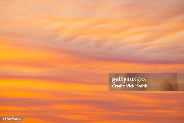orange and red colored clouds through the smoke haze - australia wildfires stock pictures, royalty-free photos & images