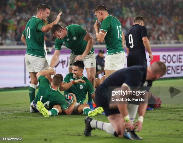 Andrew Conway of Ireland celebrates scoring his side's fourth try with his team mates during the Rugby World Cup 2019 Group A game between Ireland...