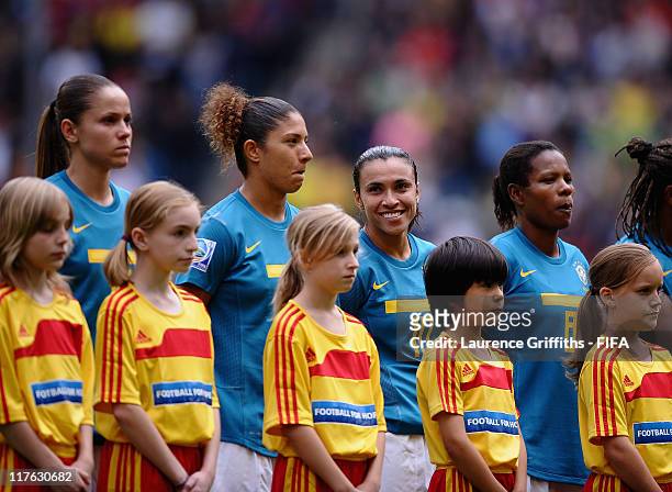 Marta of Brazil is all smile during the team line up during the FIFA Women's World Cup 2011 Group D match between Brazil and Australia at Borussia...