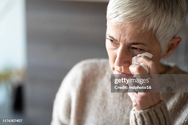 upset woman - rubbing eyes stock pictures, royalty-free photos & images